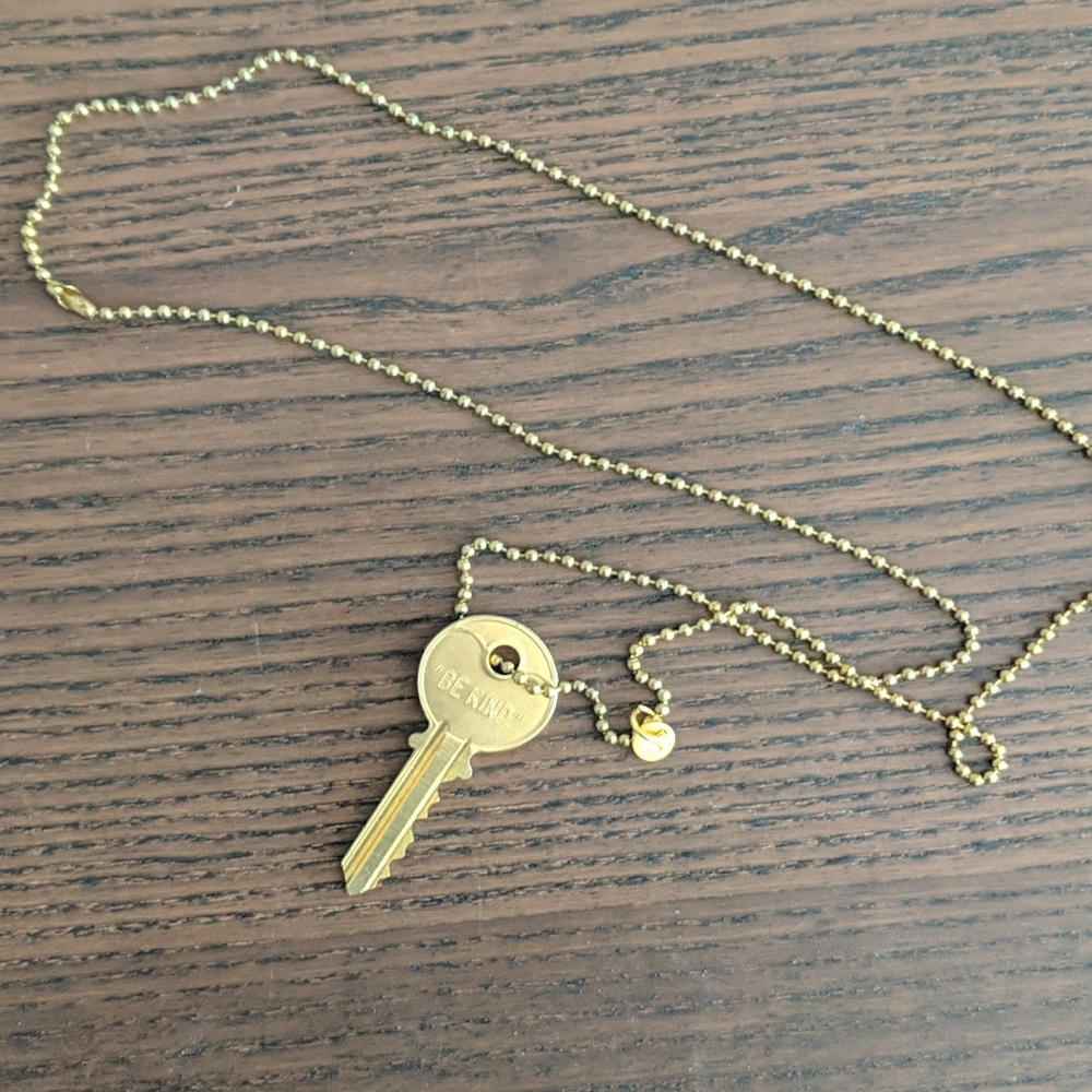Ellen degeneres be kind key necklace